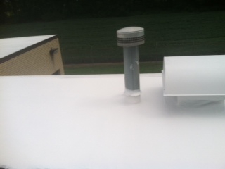 After Ohio Valley Roofing Systems, LLC Installed Waterproof Roof with Conklin Membrane Coating System in Xenia, OH